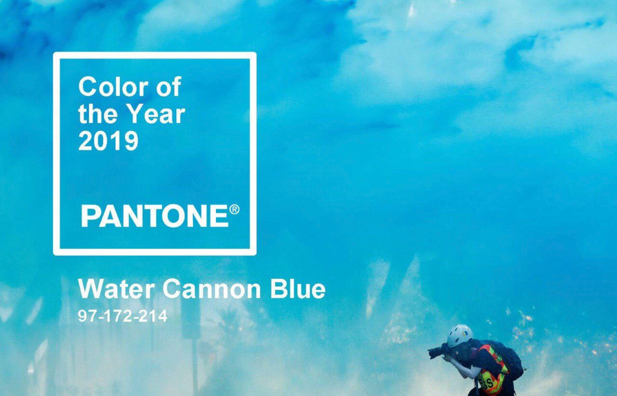 A meme using a photograph of a demonstrator ducked under a spray of blue-dyed water. Inside of a square reads the text ‘Color of the Year 2019 Pantone’ and below the text reads ‘Water Cannon Blue 97-172-214’” (original image by Reuters / Kim Kyung Hoon”